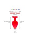 My red silicone secret plug medium